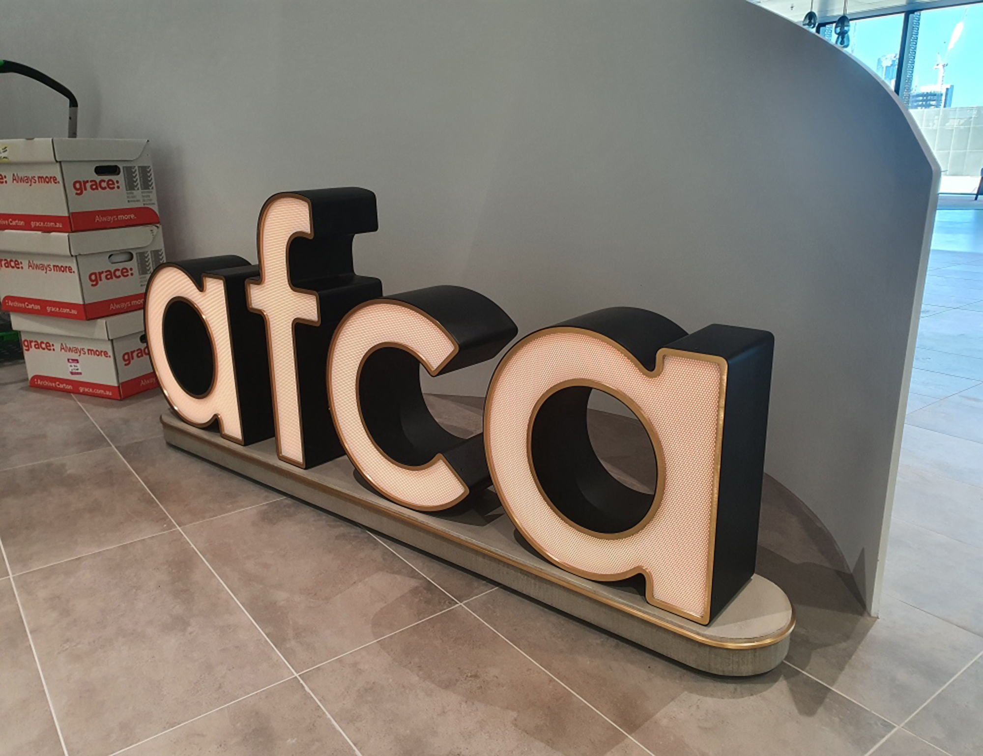 AFCA-fabricated-brass-and-aluminium-front-lit-LEDS