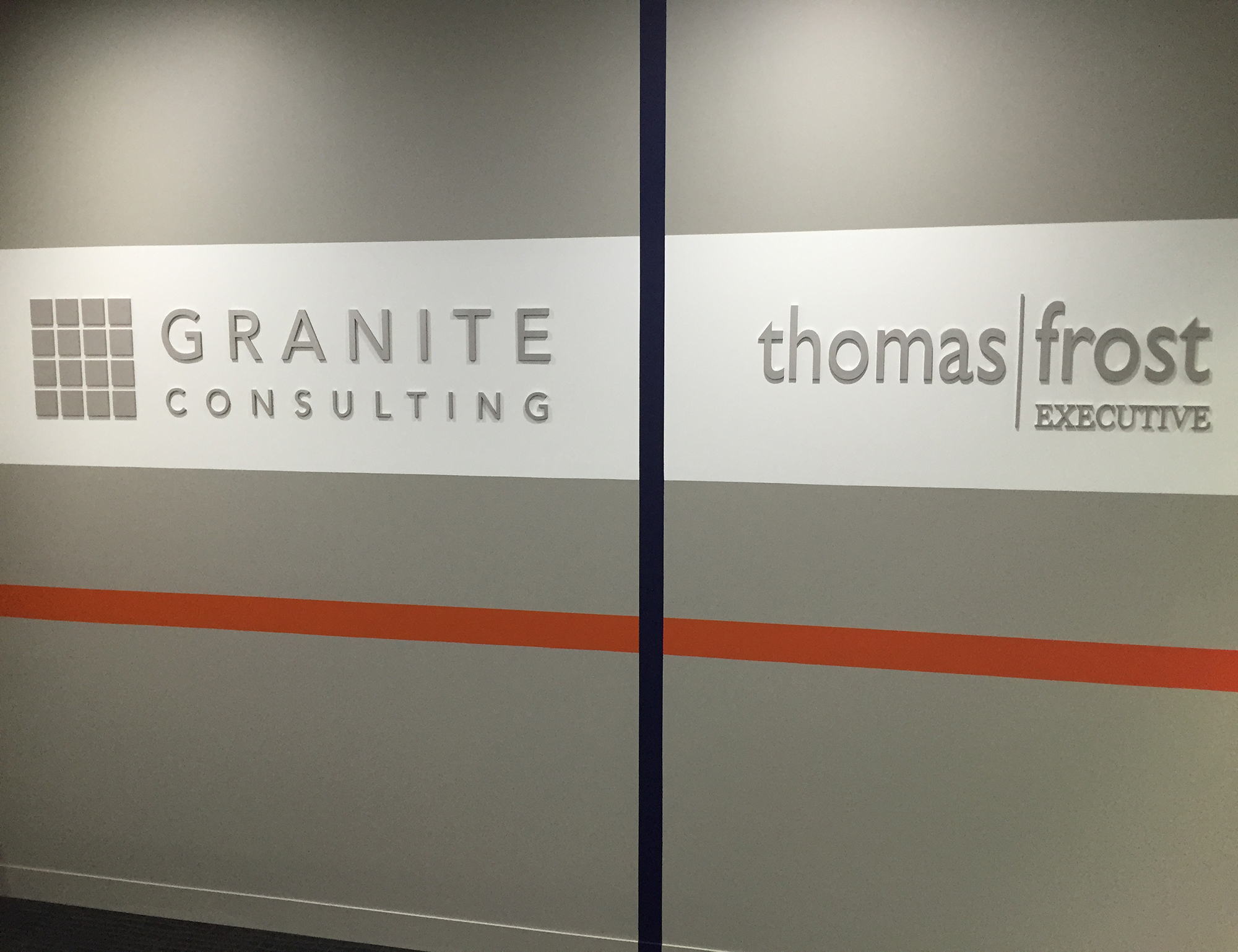 Thomas-Frost-_-Granite-Consulting-painted-acrylic-logos